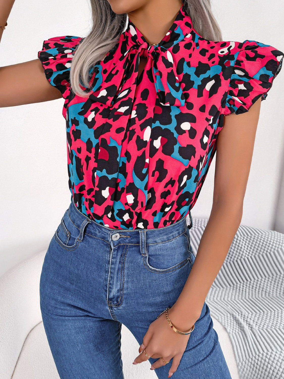 Leopard Tie Neck Cap Sleeve Blouse